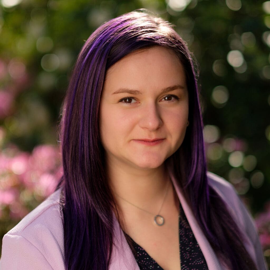 Current Doctoral Student, Natalie Turner, standing outside.